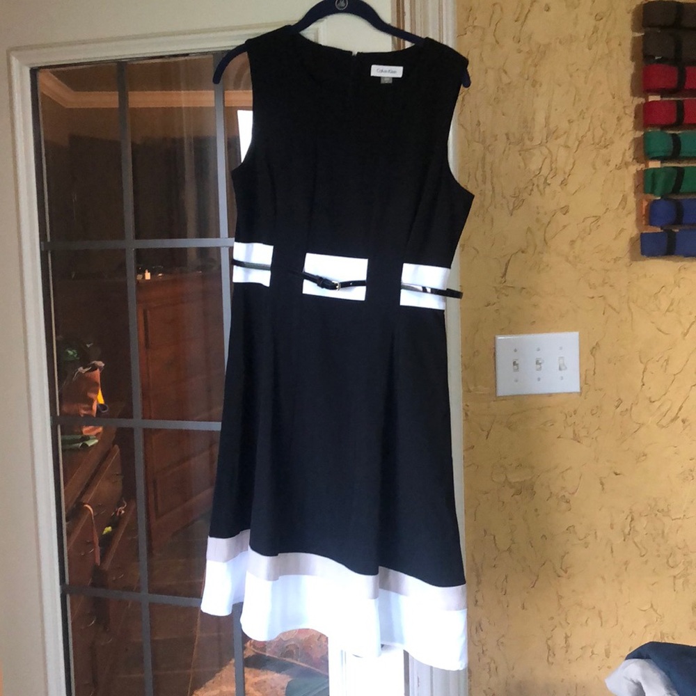Black belted Calvin Klein dress
